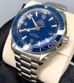 ساعه من007 OMEGA بلون مينا كحلي وسير فضي من الستانليس ستيل - Image 2